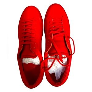 I’m selling a pair of red, Oliver Cabell sneakers. The size is 12 US/45 EUR.